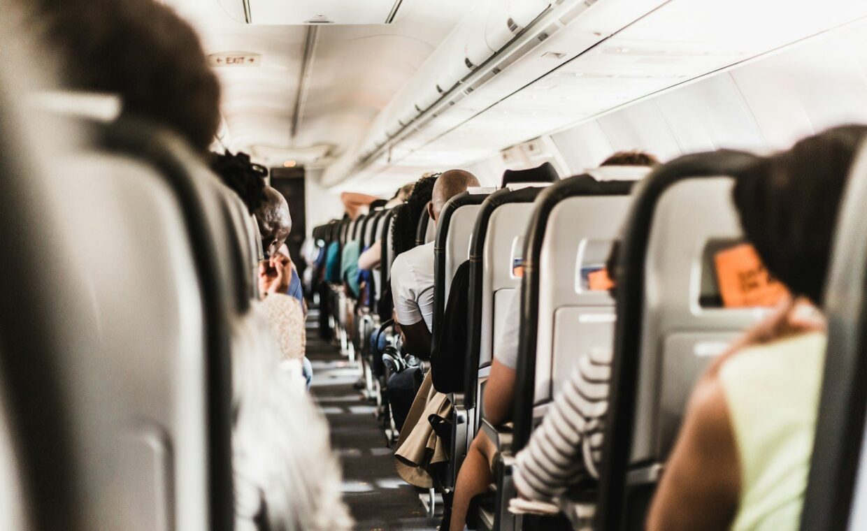 people seating in vehicle
