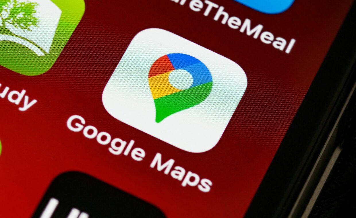 Detailed view of Google Maps app icon on a smartphone screen, showcasing digital navigation technology.